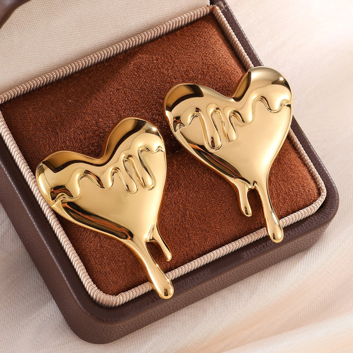 Melted Heart Statement Earrings