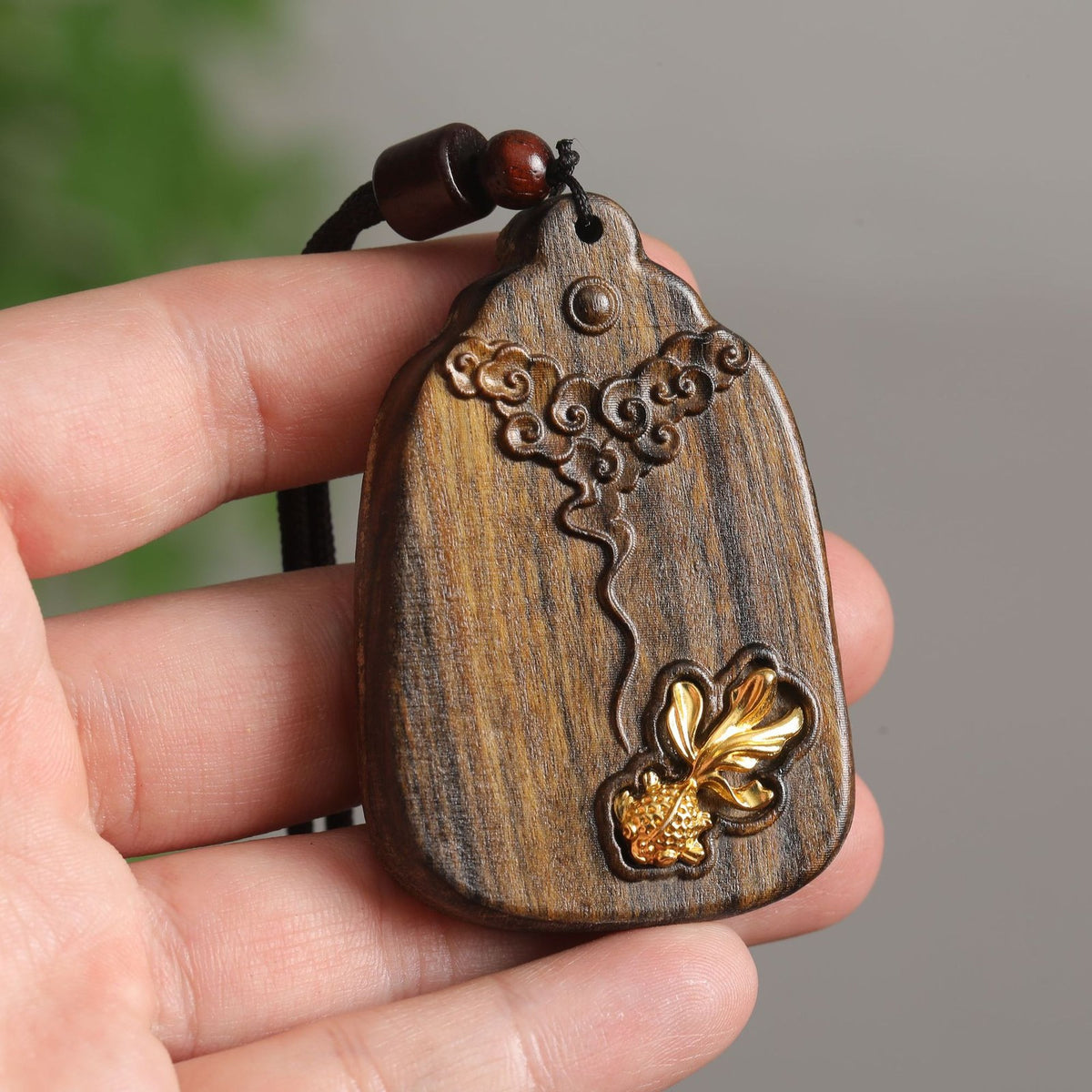 Carved Wood Koi Pendant