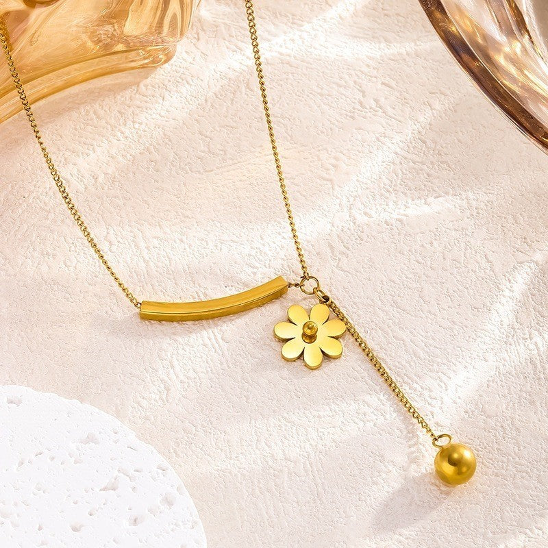 Curved Bar & Daisy Tassel Necklace