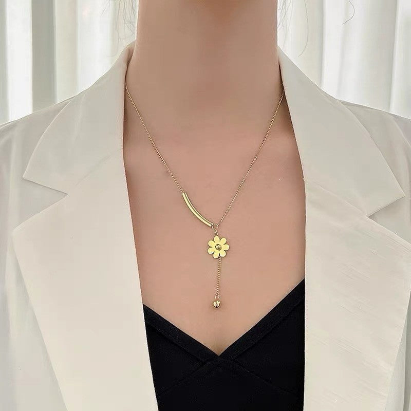 Curved Bar & Daisy Tassel Necklace