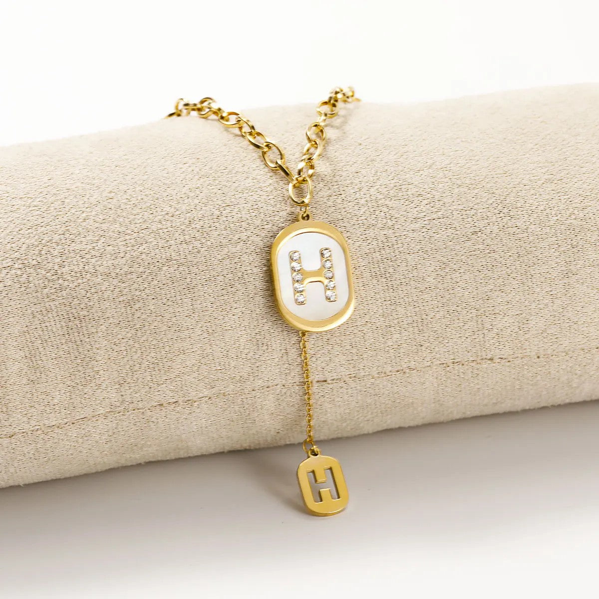 Crystal H Oval Pendant Necklace