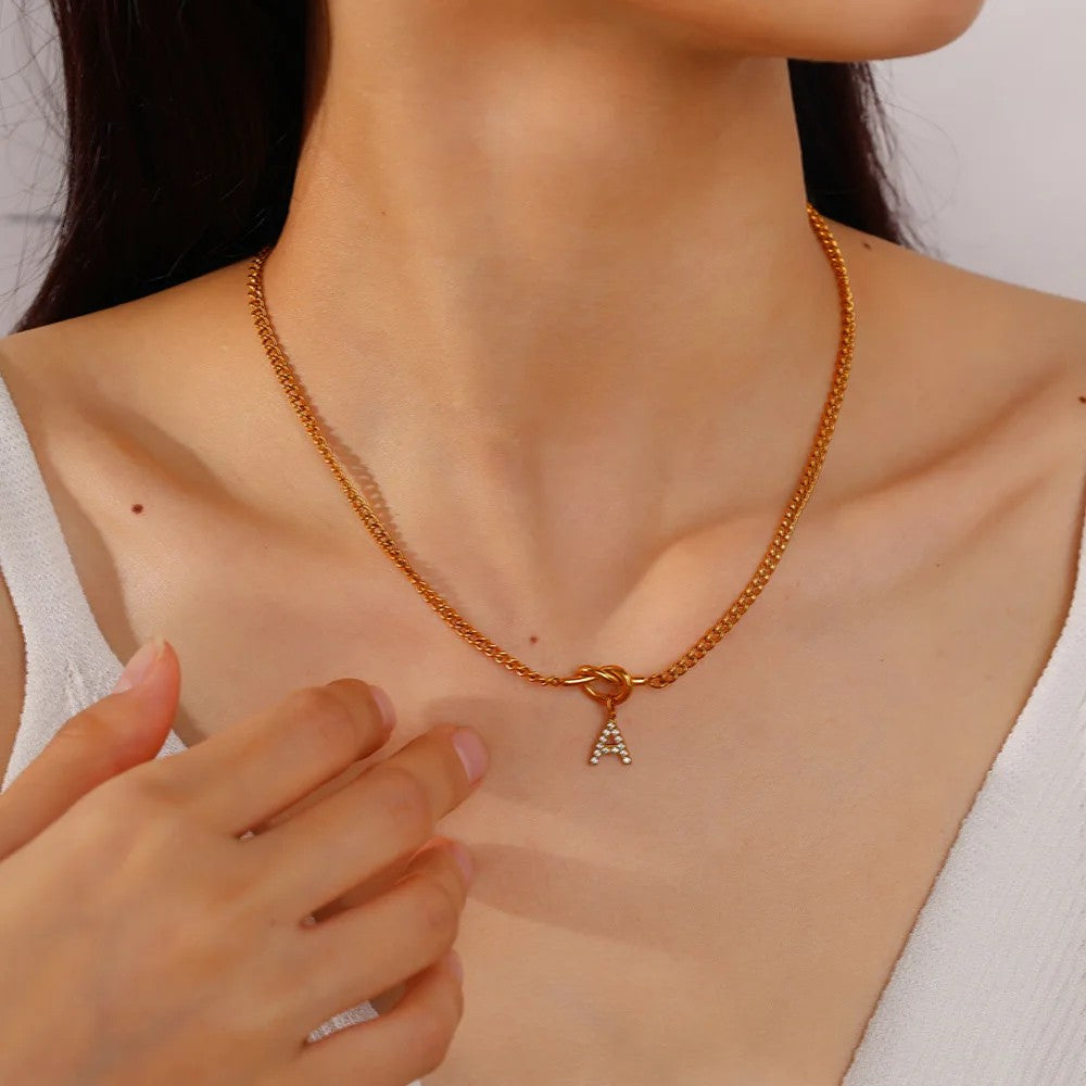 Zircon Initial Love Knot Necklace