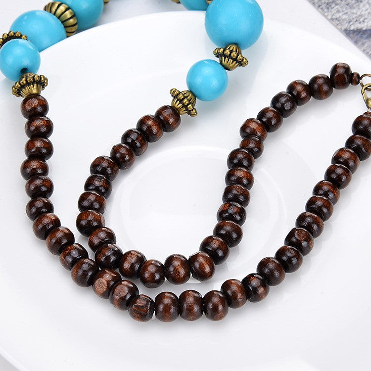 Turquoise Round Pendant Bell Necklace