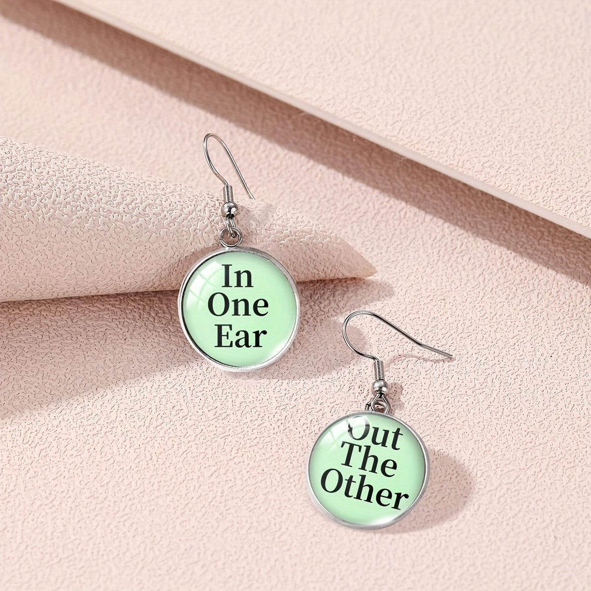 In One Ear Out The Other Earrings