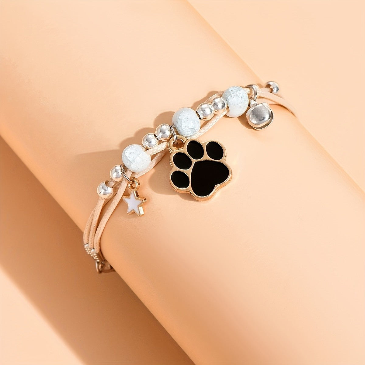 Paw Print & Star Charm Bracelet