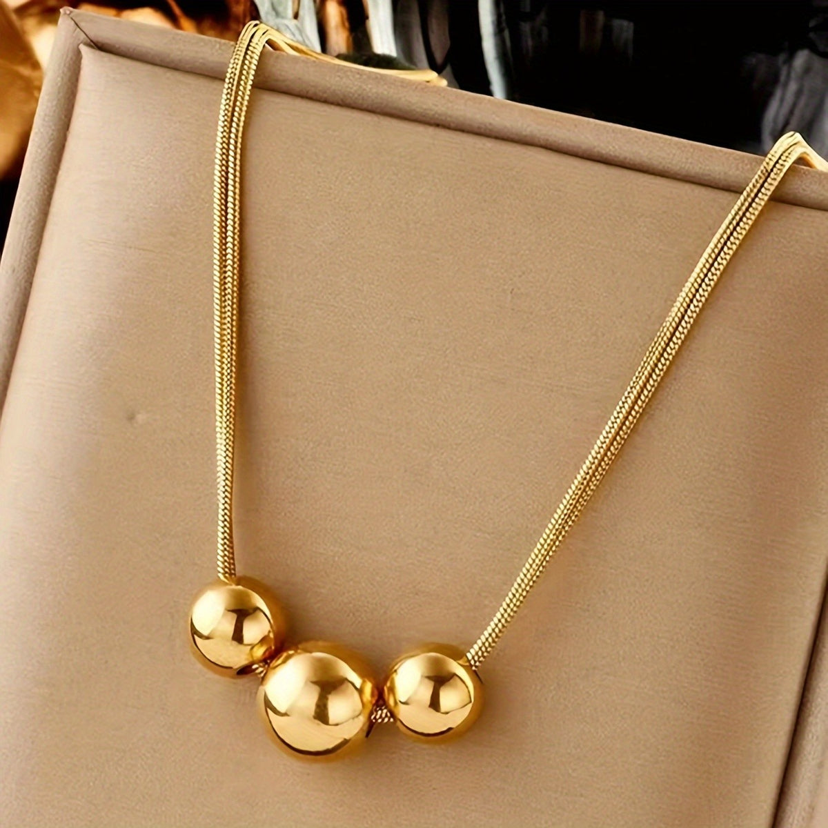 Triple Gold Bead Necklace