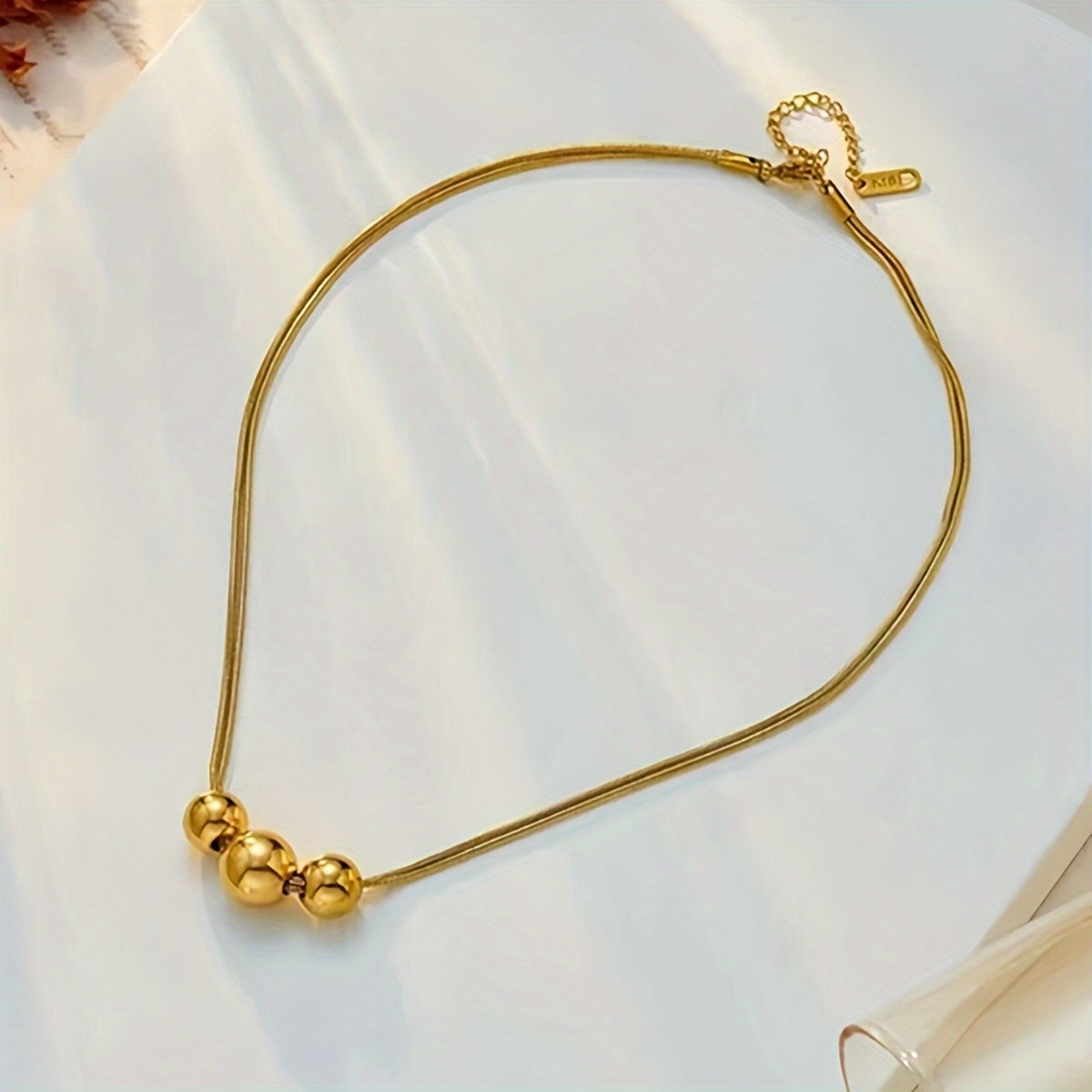 Triple Gold Bead Necklace