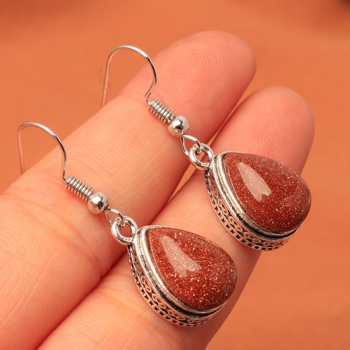 Cinnabar Teardrop Scroll Earrings