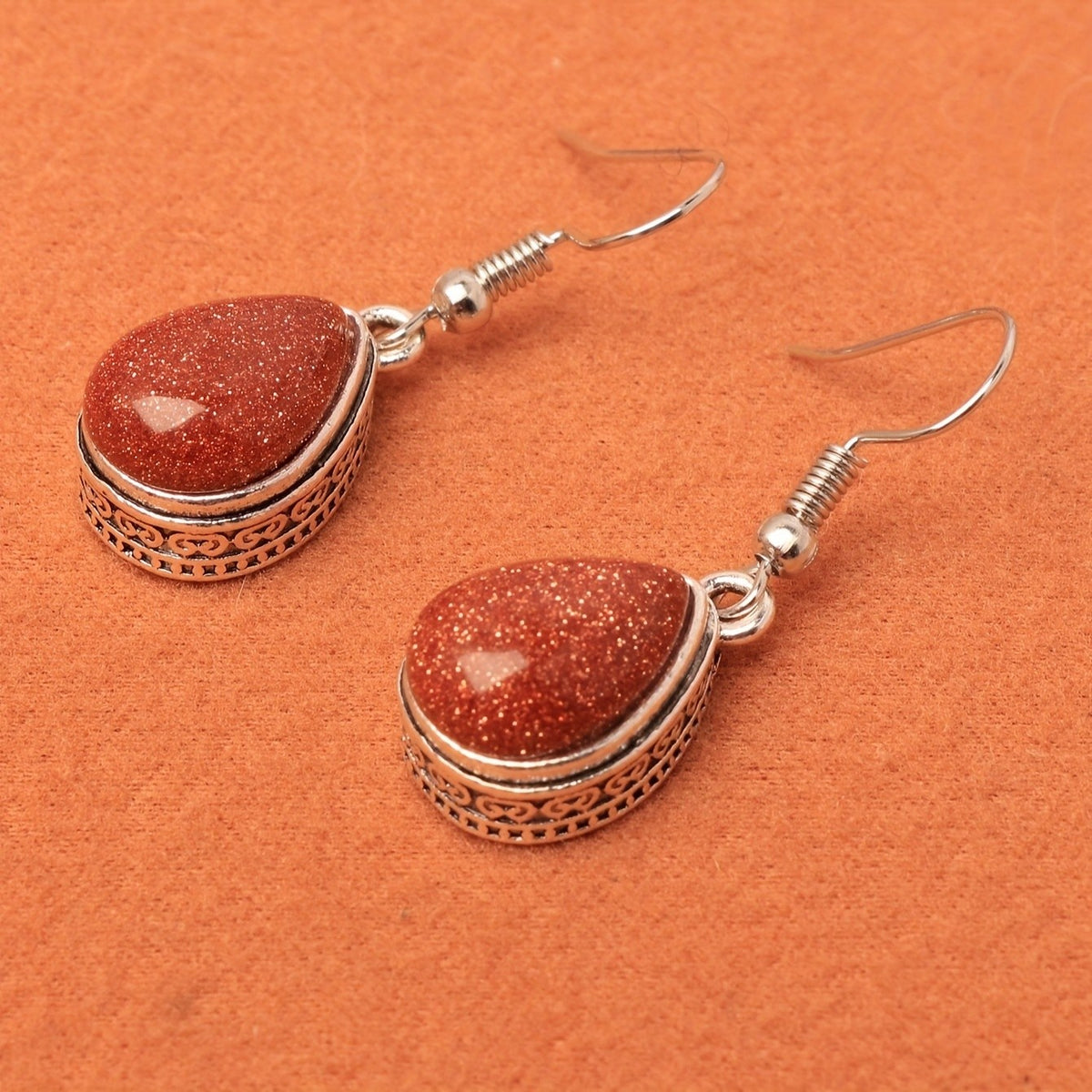 Cinnabar Teardrop Scroll Earrings