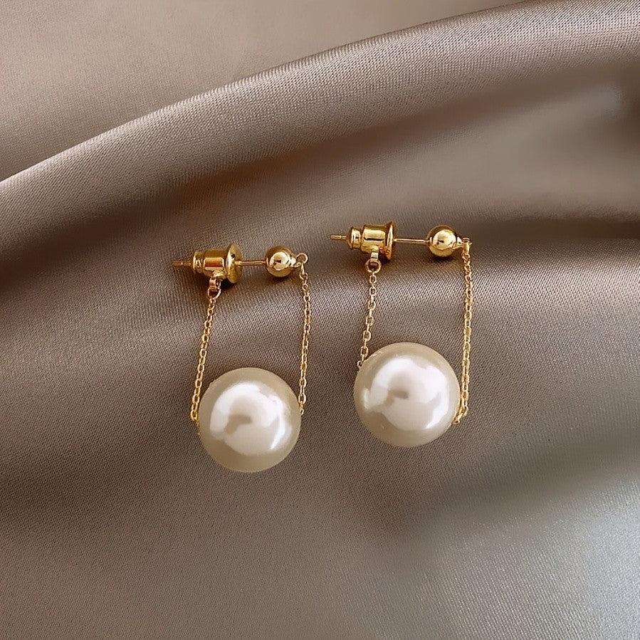 Suspended Pearl Swing Earrings