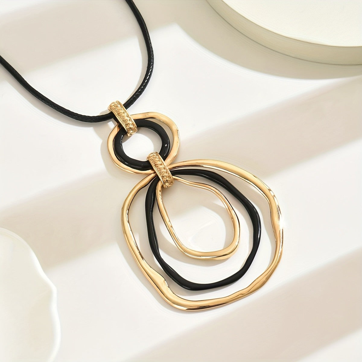 Interlocking Circle & Teardrop Cord Necklace