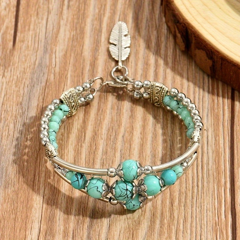 Green Bead Feather Charm Bracelet