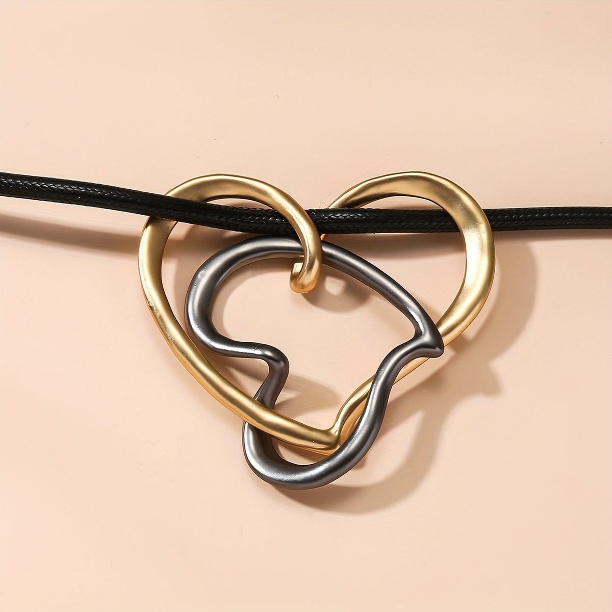 Two-Tone Interlocking Heart Cord Necklace