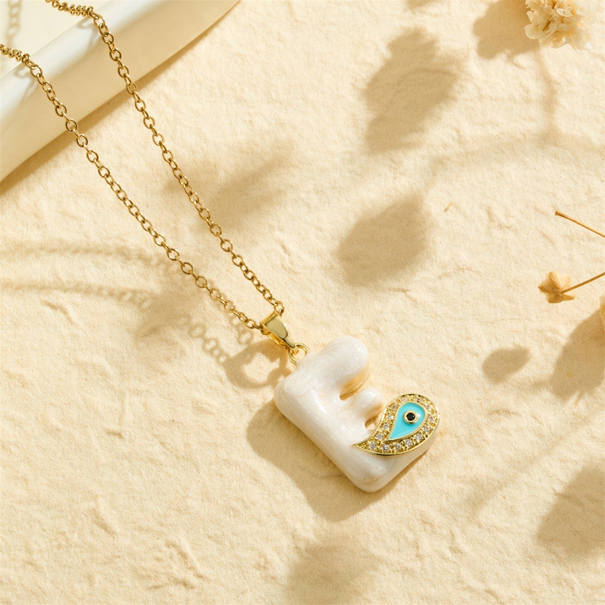 White Bubble Letter Evil Eye Necklace