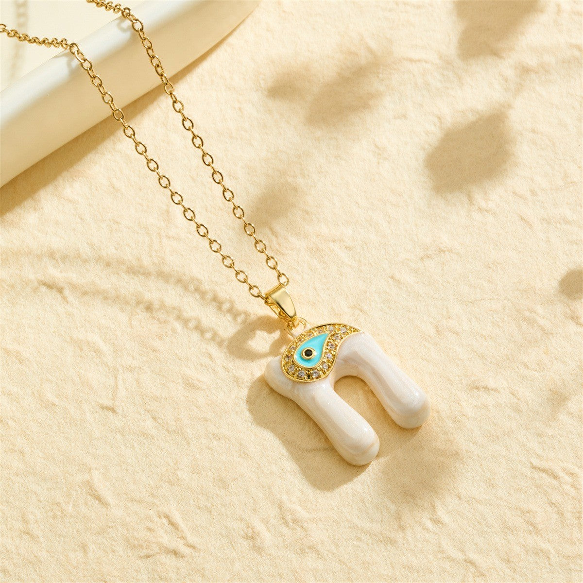 White Bubble Letter Evil Eye Necklace