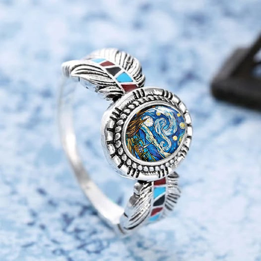 Swirling Sky Feather Ring