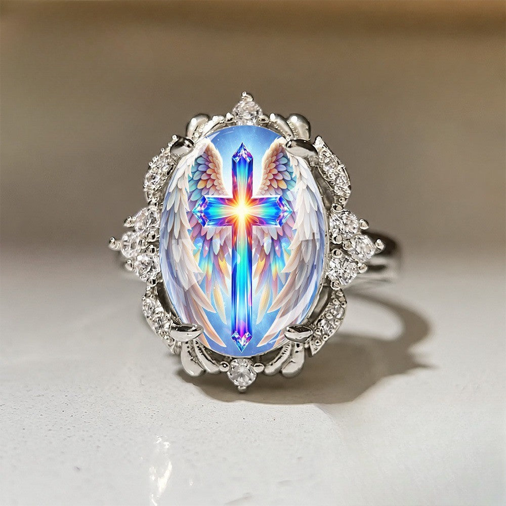 Radiant Cross & Wing Ring