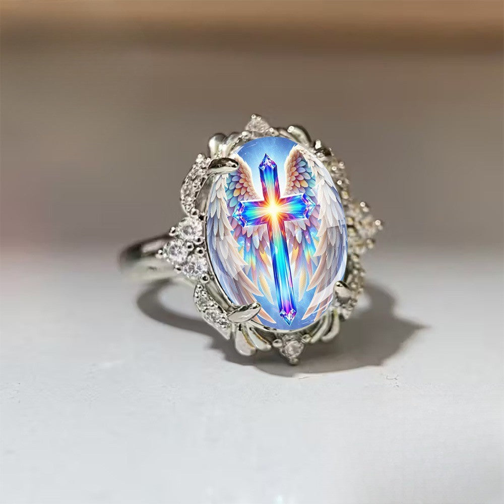 Radiant Cross & Wing Ring