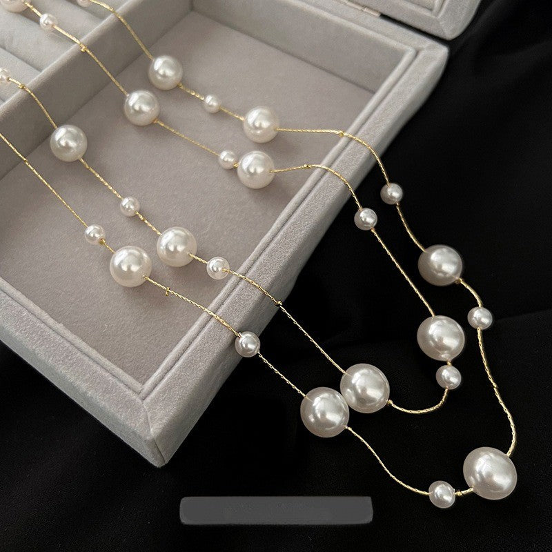 Multi-Strand Pearl Station Necklace