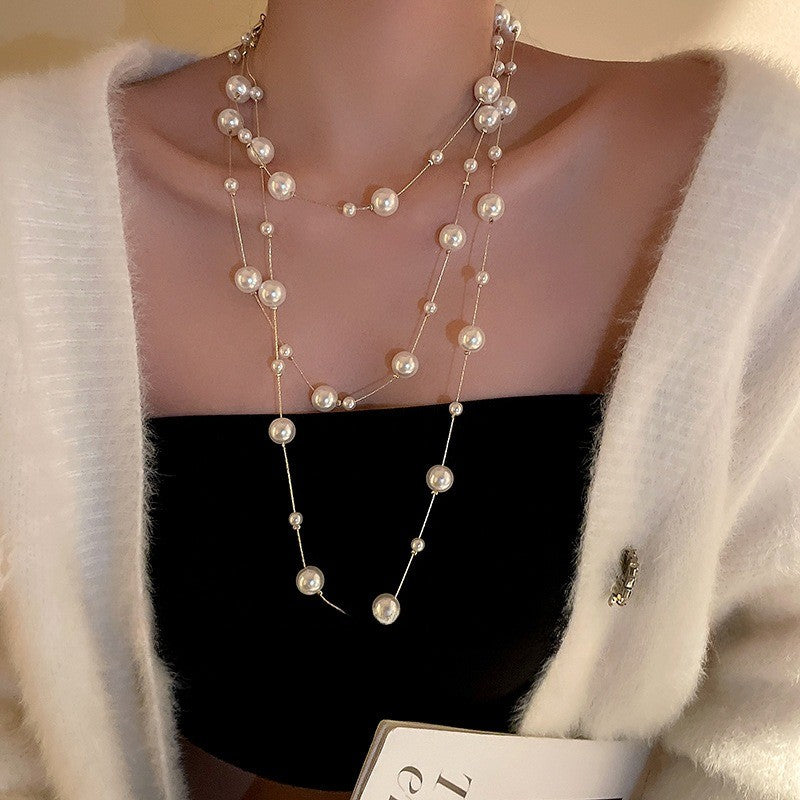 Multi-Strand Pearl Station Necklace