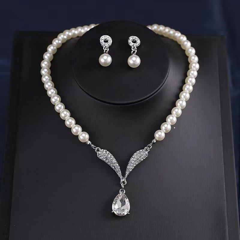 Pearl & Crystal Wing Necklace Set