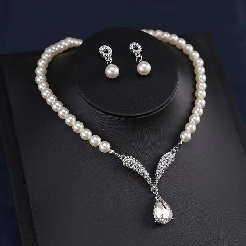 Pearl & Crystal Wing Necklace Set