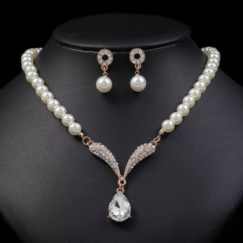 Pearl & Crystal Wing Necklace Set