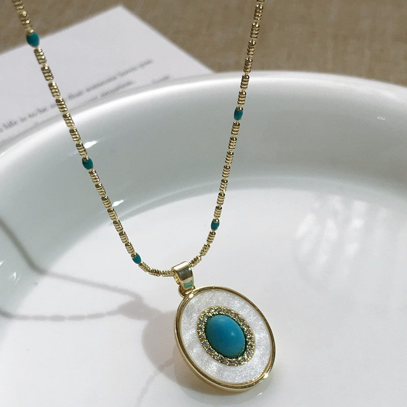 Turquoise Oval Shell Necklace