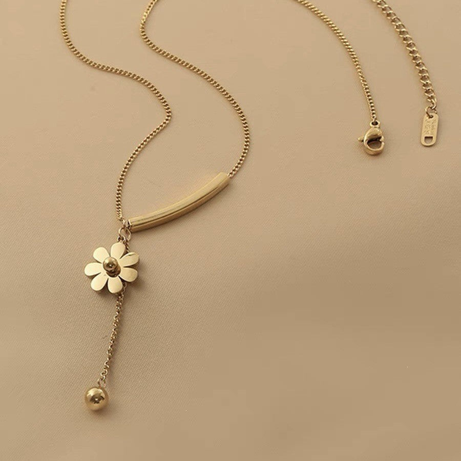 Curved Bar & Daisy Tassel Necklace