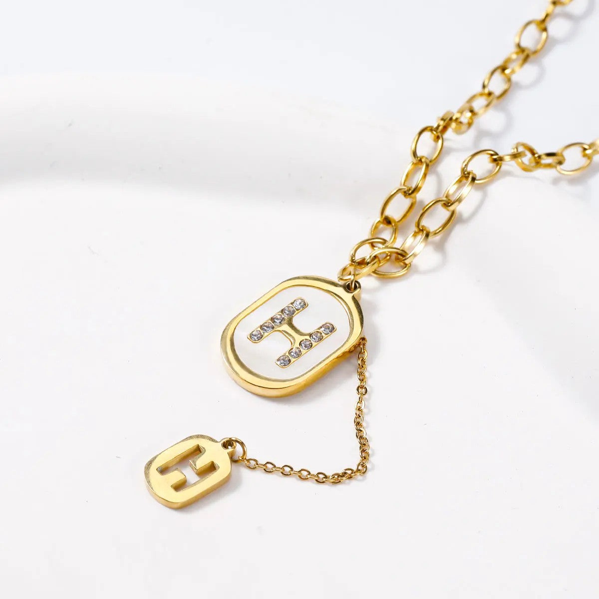Crystal H Oval Pendant Necklace