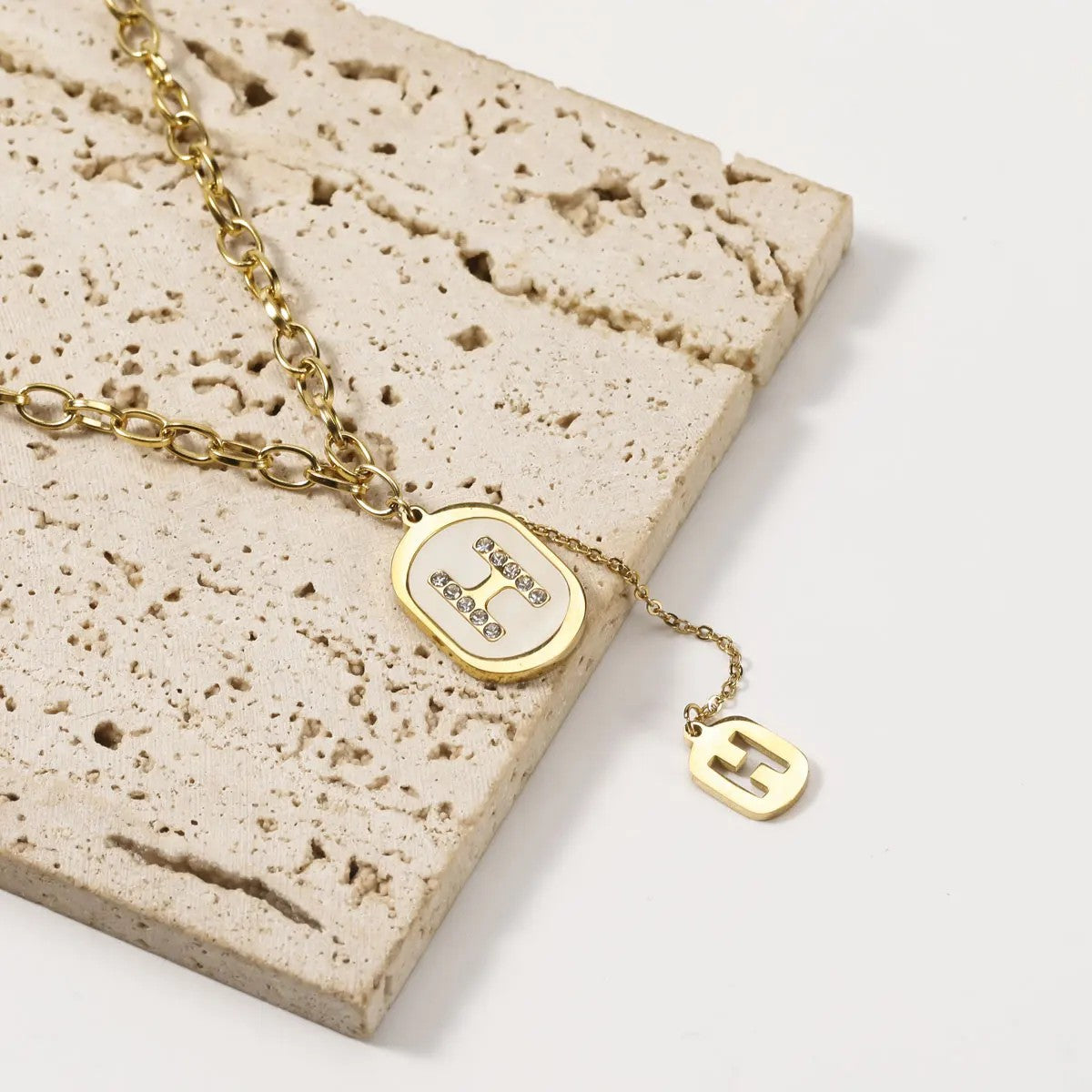 Crystal H Oval Pendant Necklace