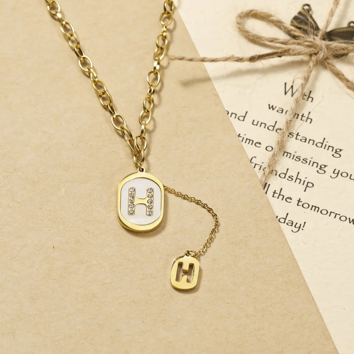 Crystal H Oval Pendant Necklace