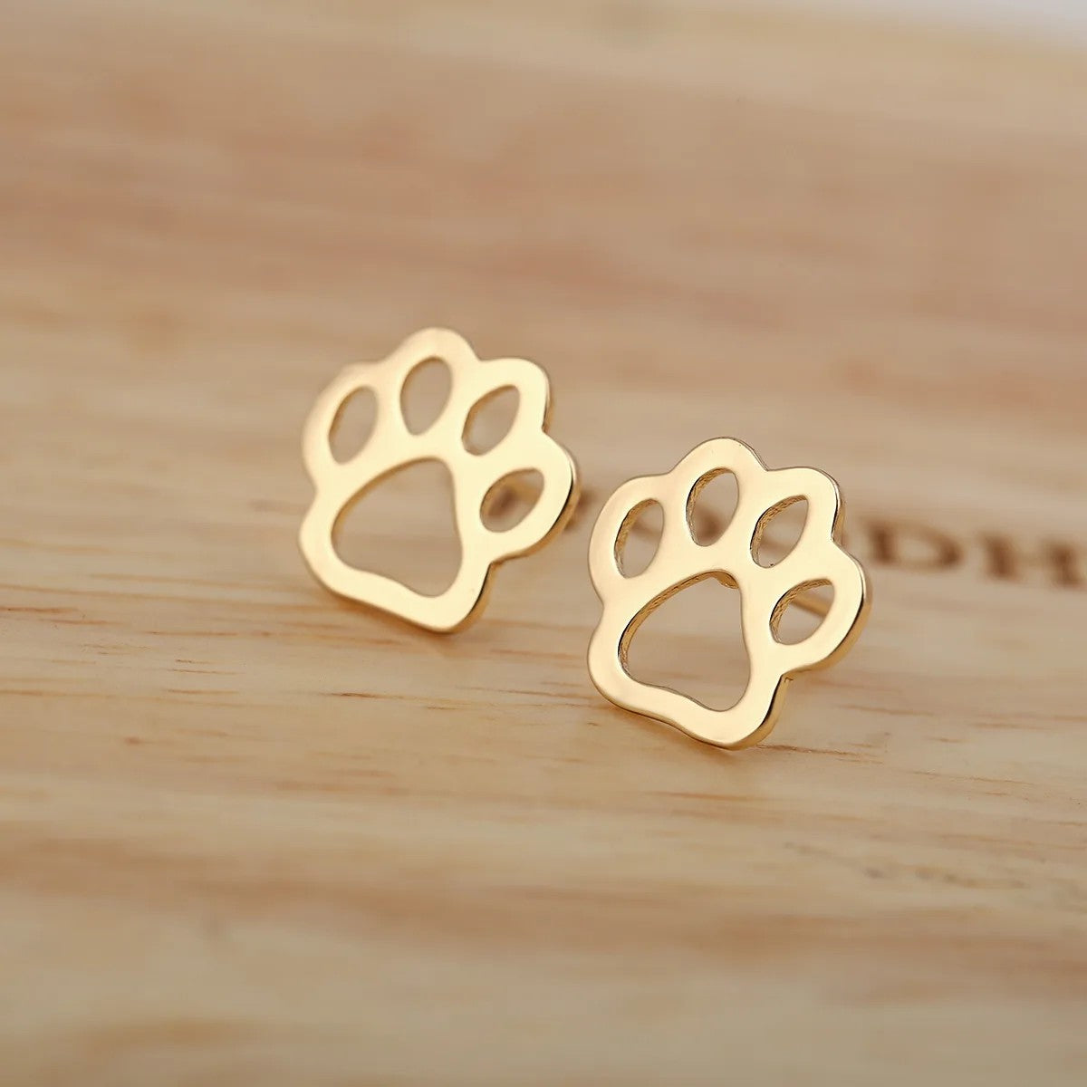Hollow Paw Stud Earrings