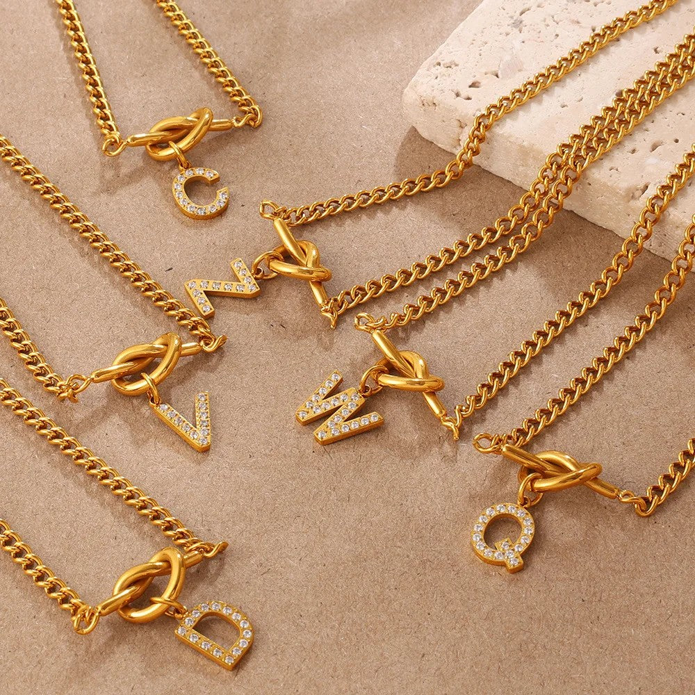 Zircon Initial Love Knot Necklace