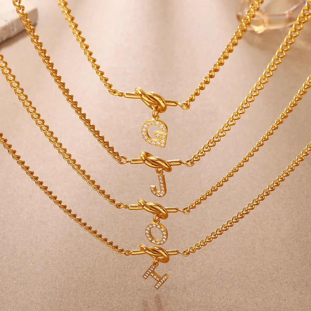 Zircon Initial Love Knot Necklace