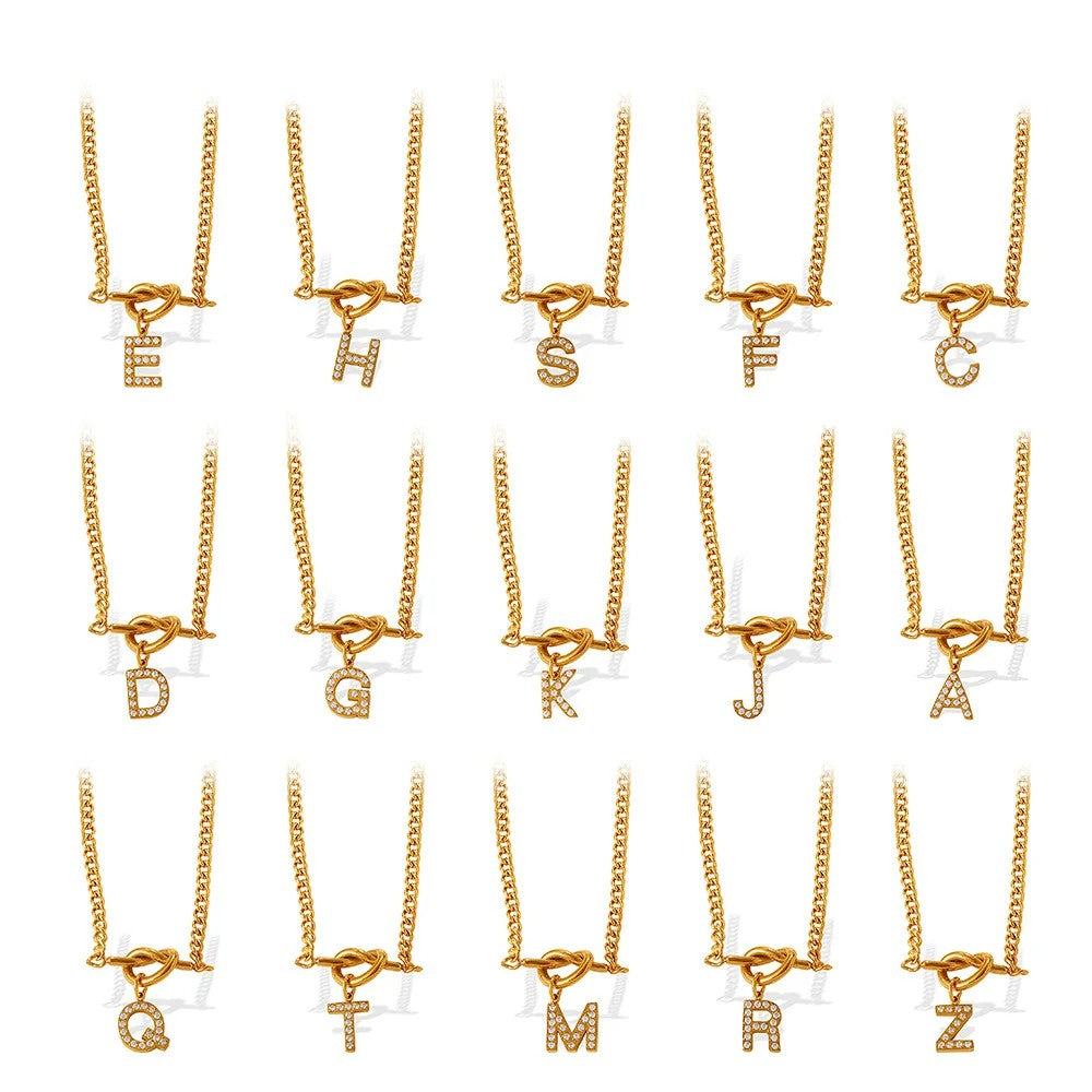 Zircon Initial Love Knot Necklace