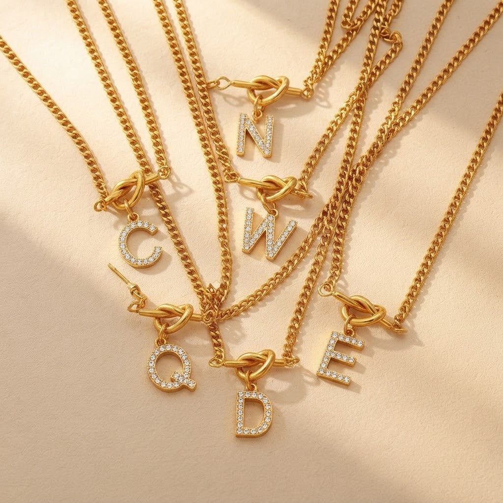 Zircon Initial Love Knot Necklace