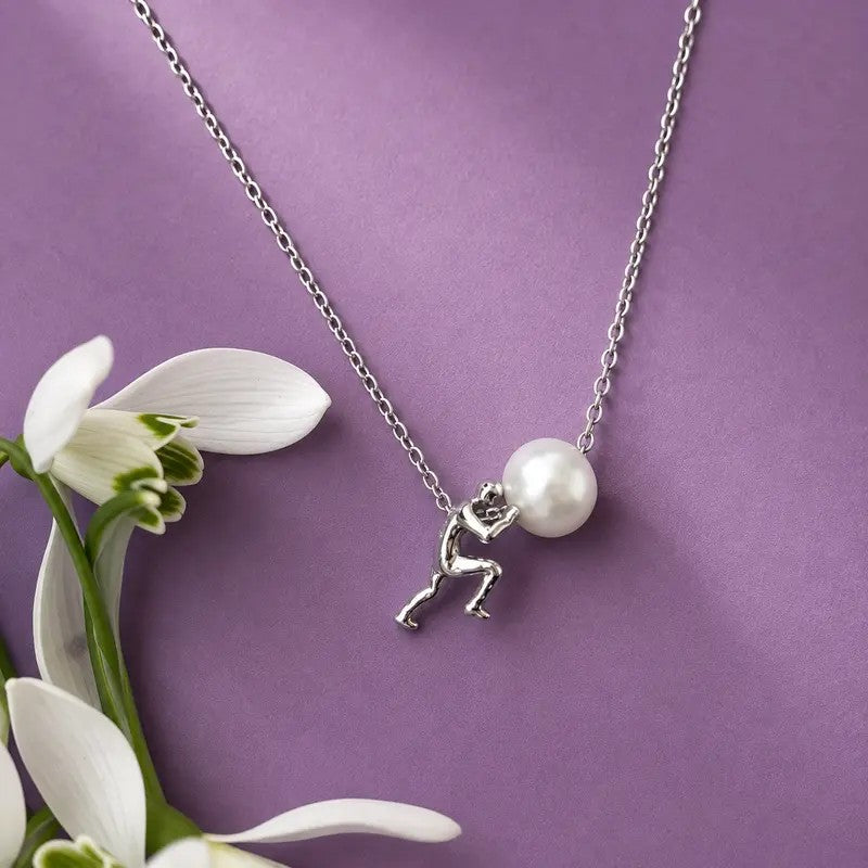 Figure Holding Pearl Necklace
