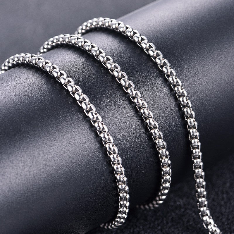 Black & Gold Filigree Cross Necklace