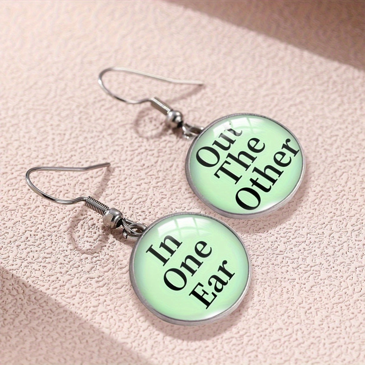 In One Ear Out The Other Earrings