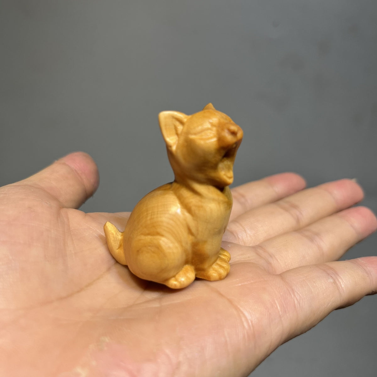Carved Wood Yawning Cat Figurine