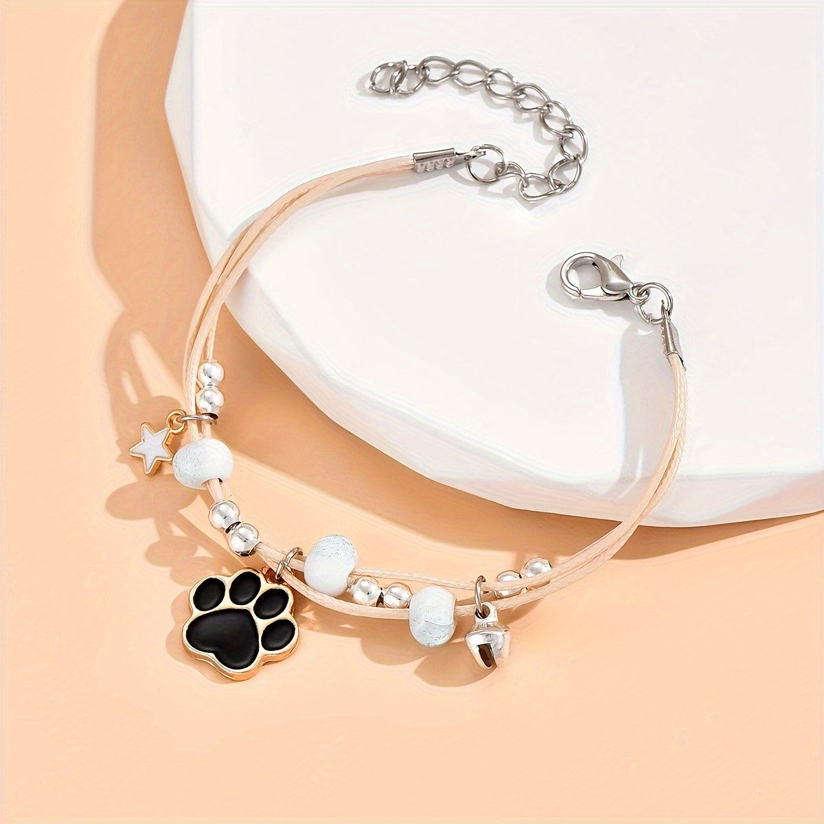 Paw Print & Star Charm Bracelet