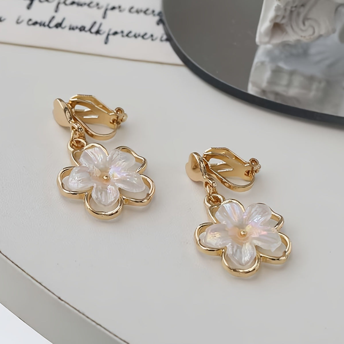 White Floral Clip-On Earrings