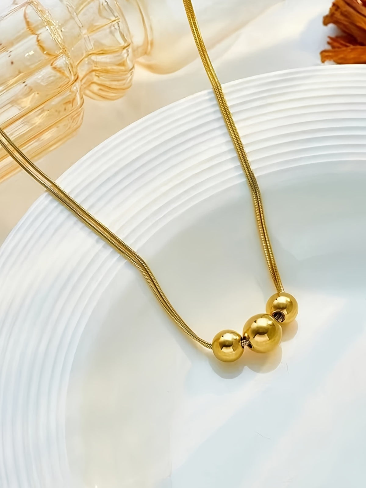 Triple Gold Bead Necklace