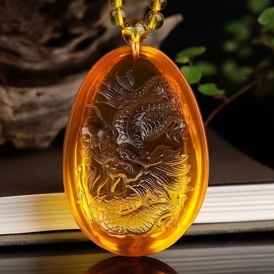 Carved Dragon Amber Pendant