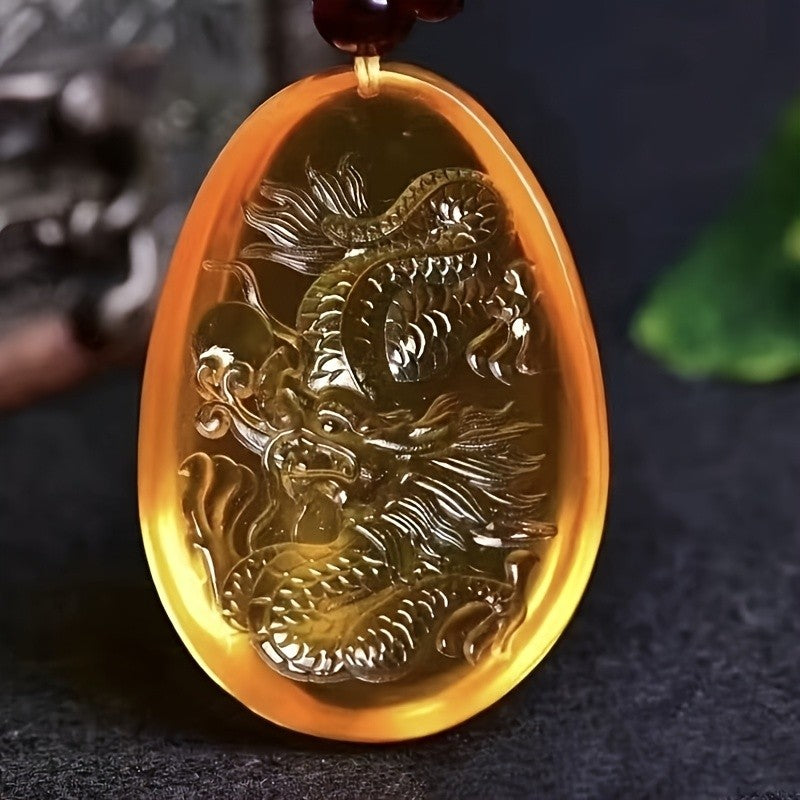 Carved Dragon Amber Pendant
