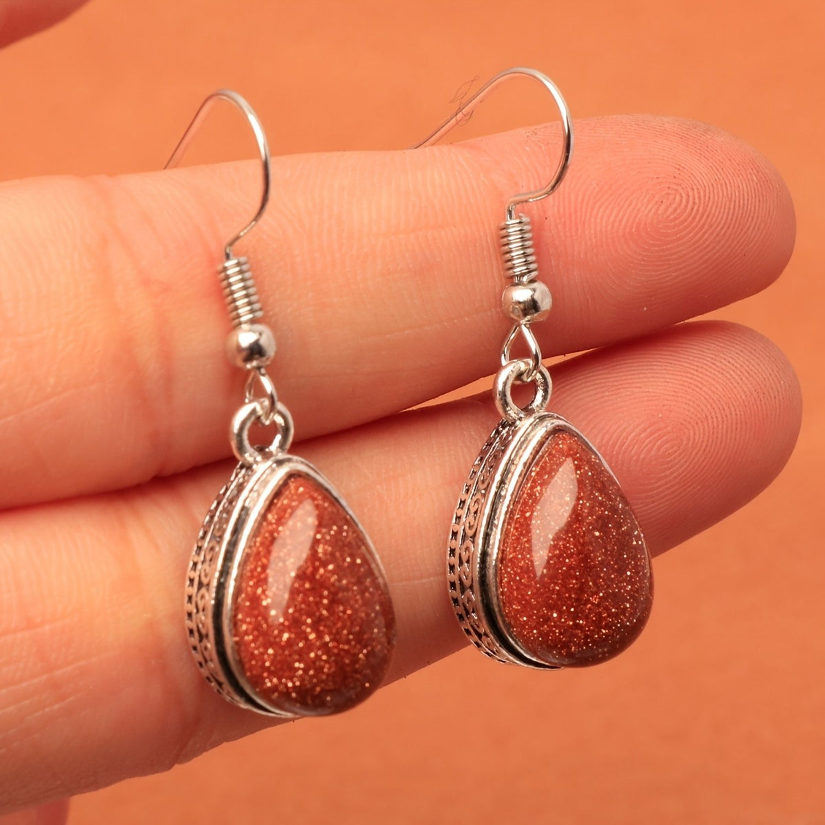 Cinnabar Teardrop Scroll Earrings