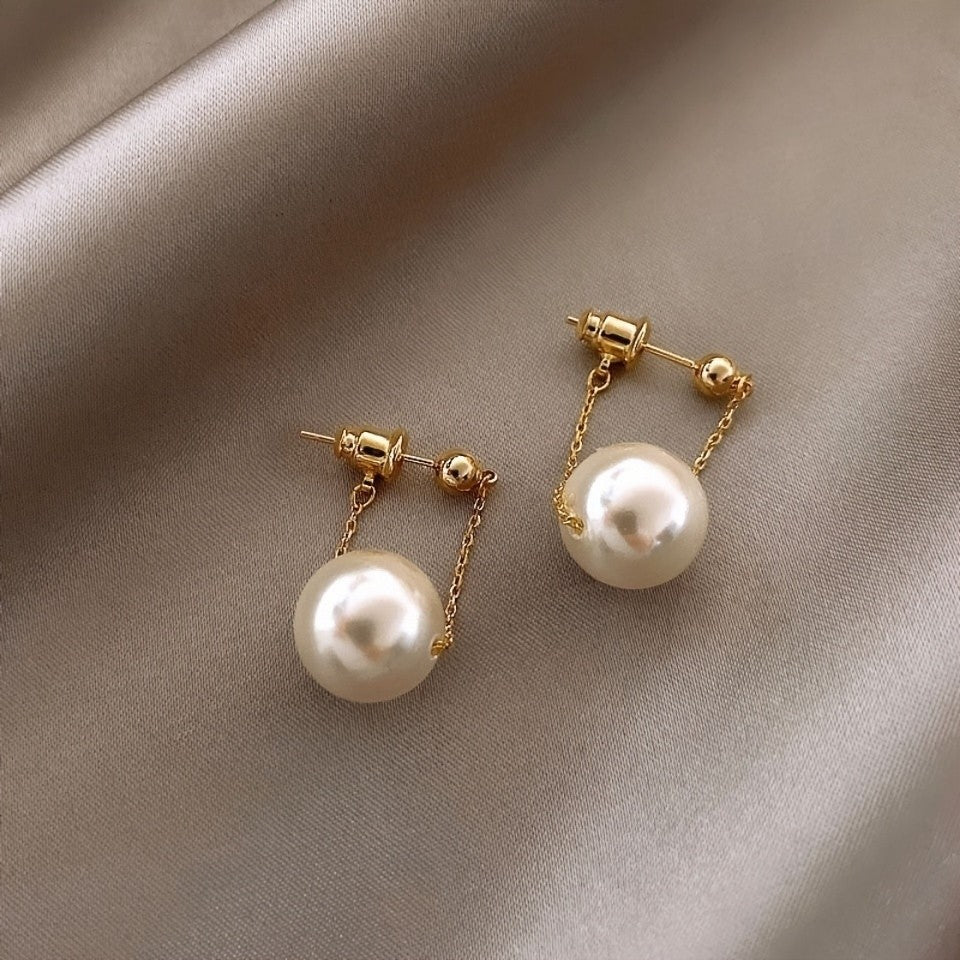 Suspended Pearl Swing Earrings