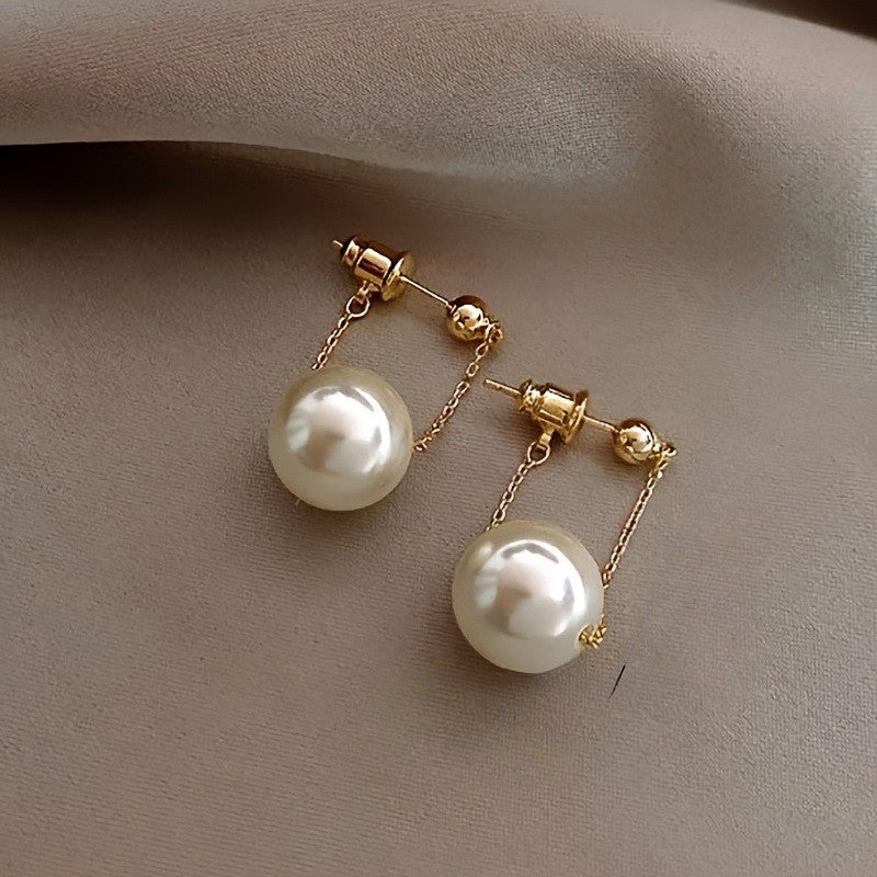 Suspended Pearl Swing Earrings