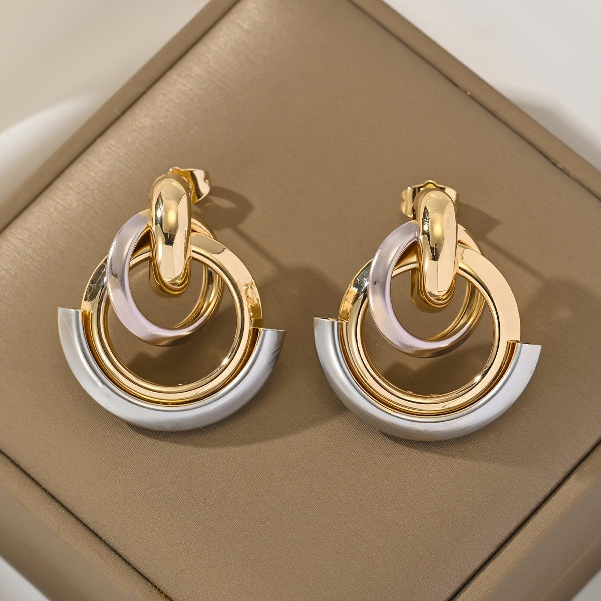 Two-Tone Interlocking Hoop Earrings